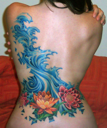 waves-and-flowers-lower-back-tattoo